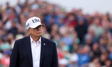 President Donald Trump looks across the 18th green during the trophy presentation at the Amgen Irish Open at Trump International Golf Links in Doonbeg