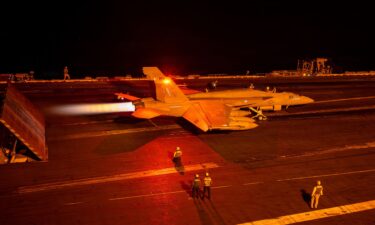 An F/A-18 Super Hornet launches from the flight deck of the USS George Washington