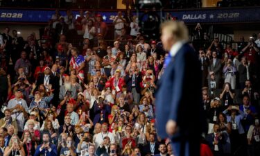 Attendees cheers as President Donald Trump