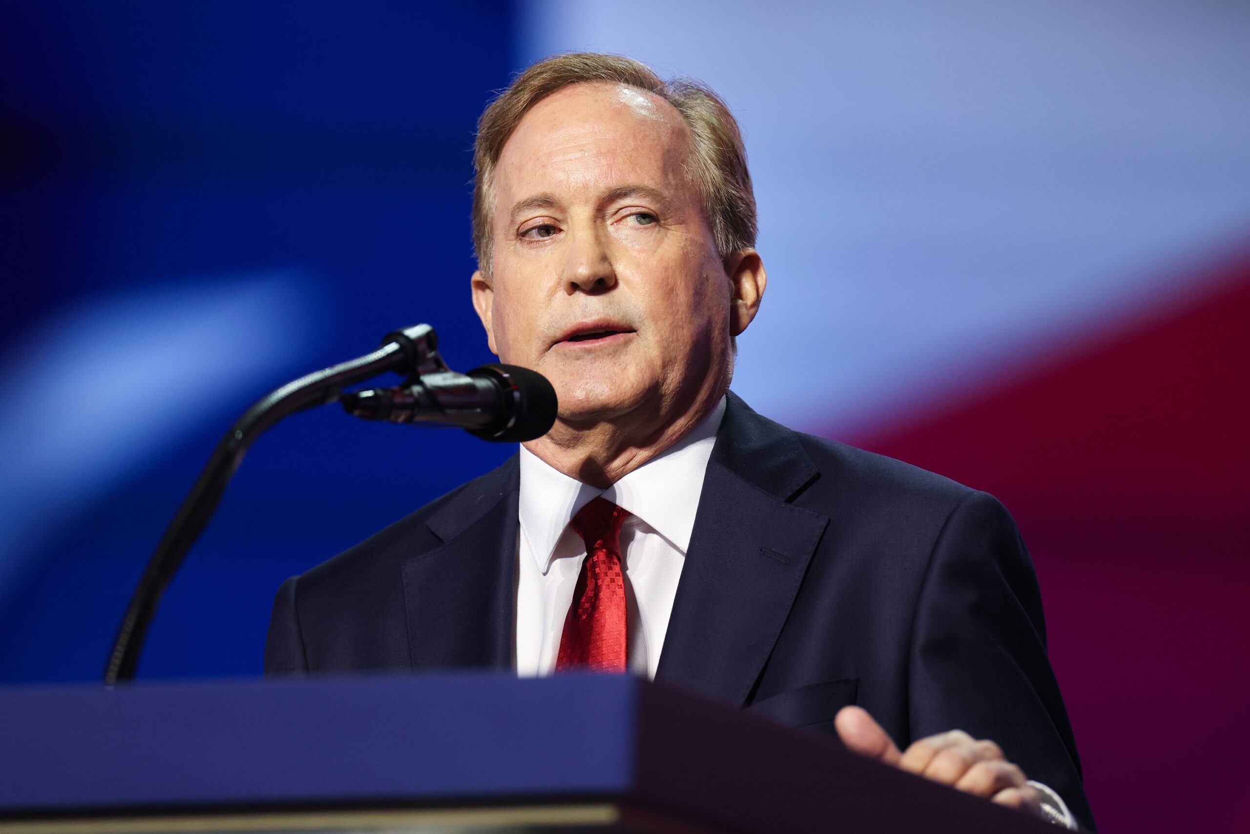 <i>Kevin Dietsch/Getty Images via CNN Newsource</i><br/>Texas Attorney General Ken Paxton speaks on stage on the first day of the 2026 Republican National Convention in Dallas on September 9.