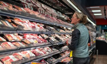 A local shopper searches for meat products at a supermarket in South Burlington