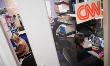 CNN White House Senior Reporter Betsy Klein and CNN White House Reporter Molly English work in the CNN office after being allowed back on to the grounds of the White House on September 24 in Washington
