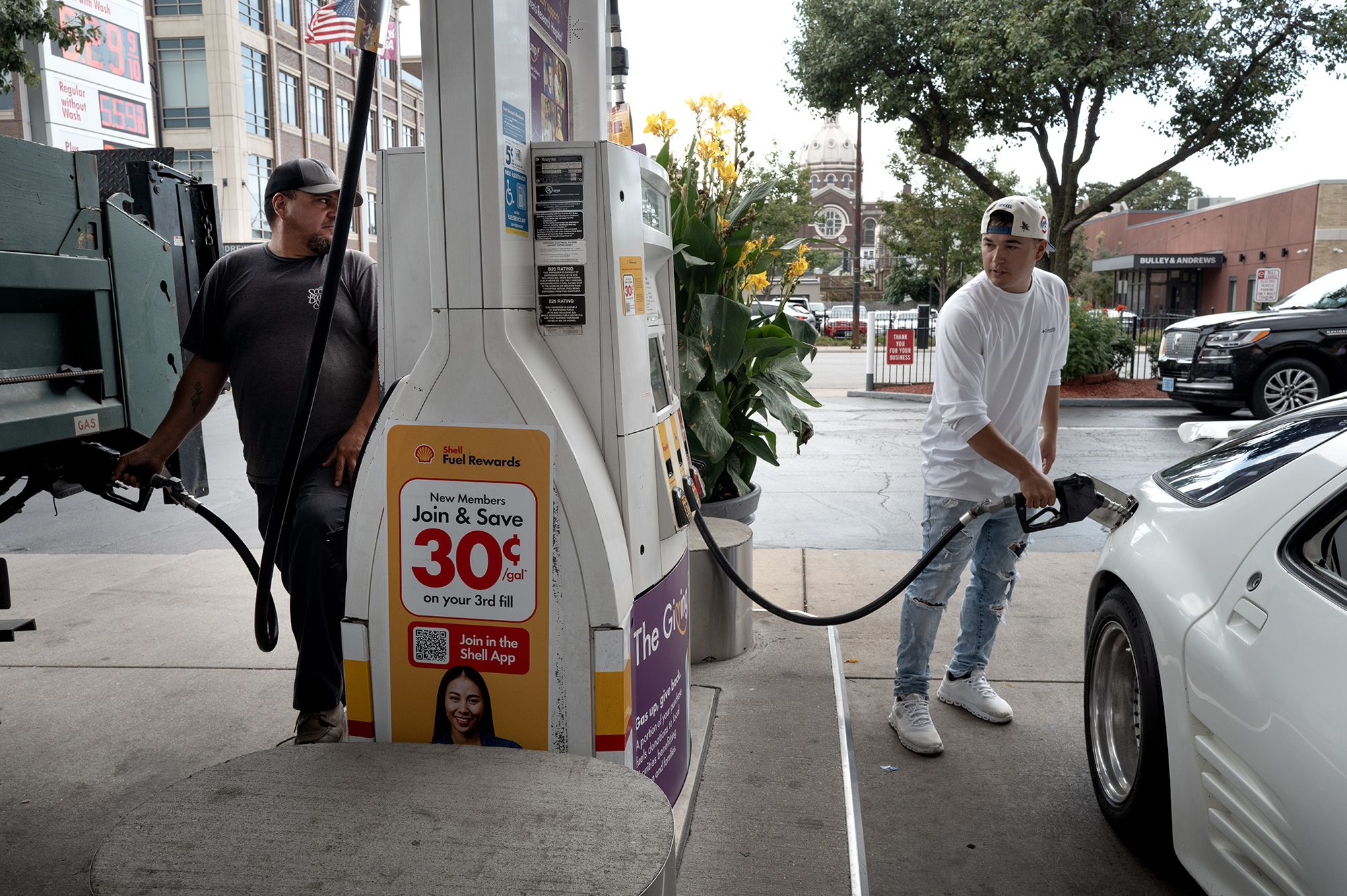 <i>Scott Olson/Getty Images via CNN Newsource</i><br/>Customers purchase gas at a station on September 15