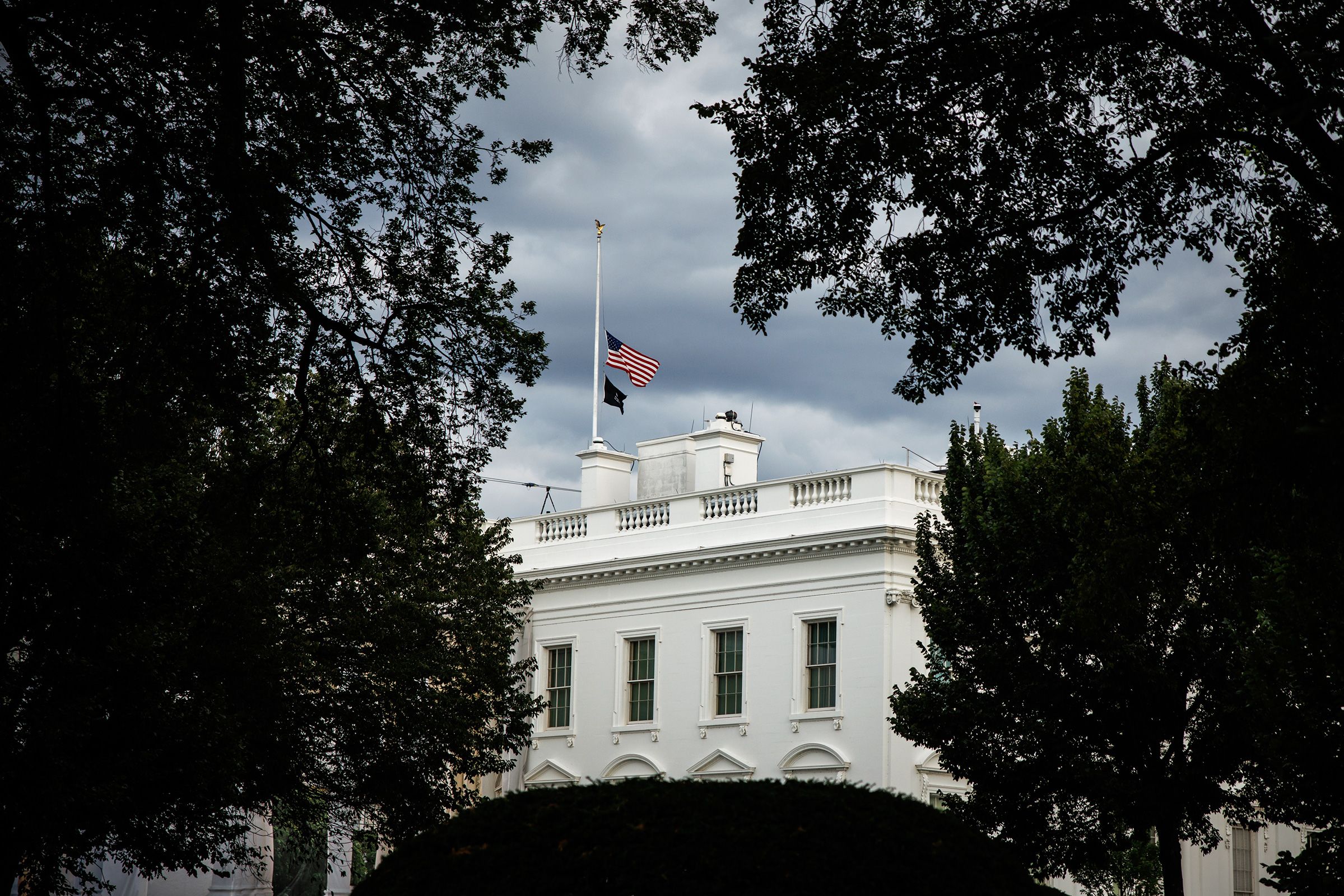 <i>Samuel Corum/Sipa/Bloomberg/Getty Images via CNN Newsource</i><br/>Flags fly over the White House