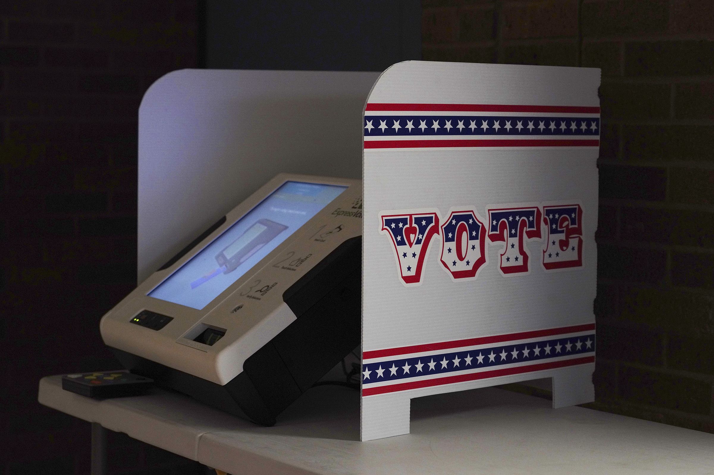<i>Thomas Werner/Bloomberg/Getty Images/File via CNN Newsource</i><br/>A voting booth sits at a polling station in Milwaukee