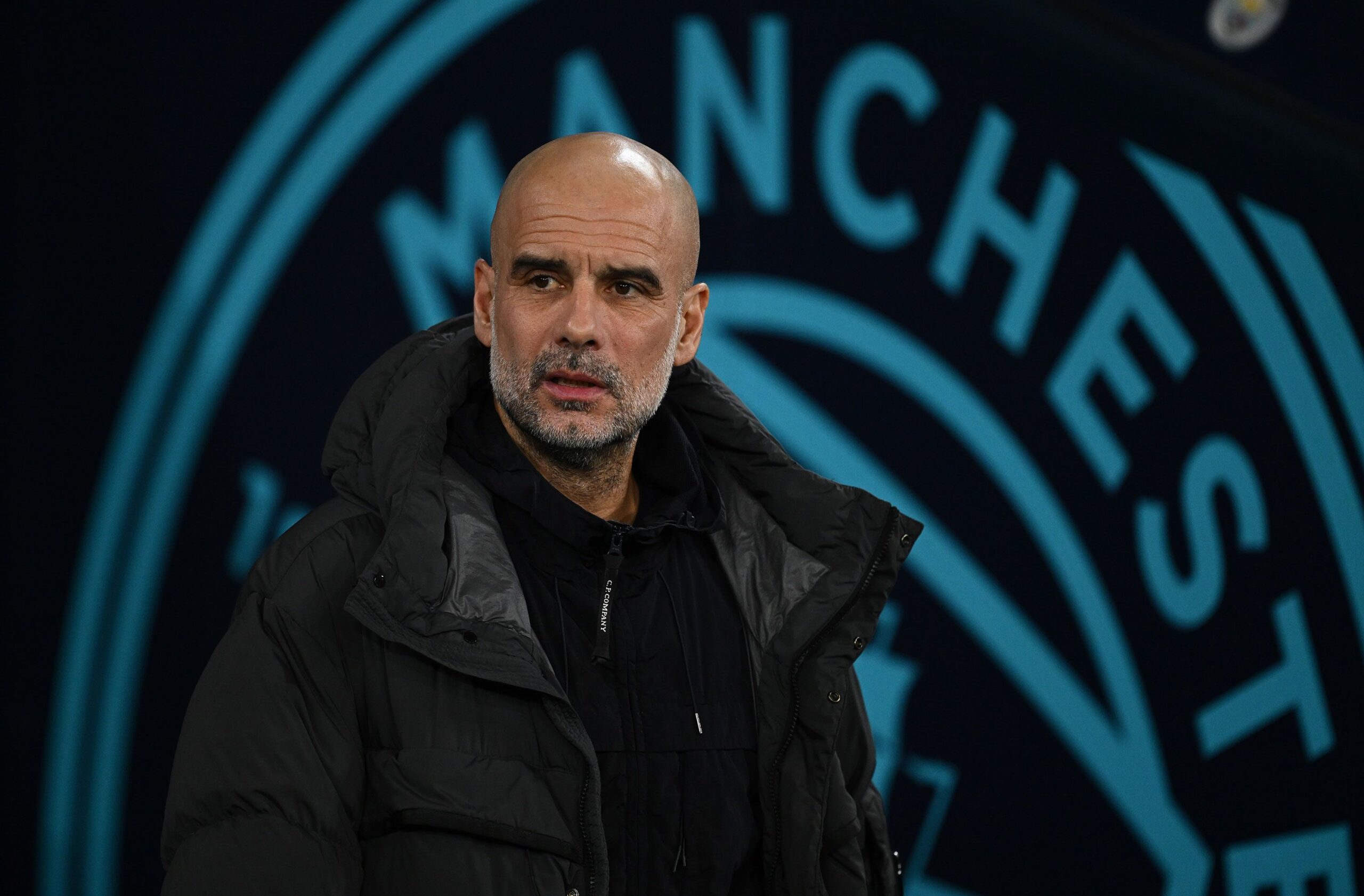 <i>Jakub Porzycki/NurPhoto via Getty Images/FILE via CNN Newsource</i><br/>Manchester City logo is seen on a jersey.