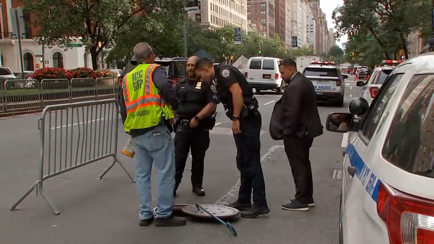 <i>WABC via CNN Newsource</i><br/>Law enforcement investigate a manhole where three individuals were seen exiting the sewers near Netanyahu's hotel on September 25 in New York.