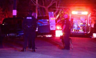 Law enforcement responds near the scene on Thursday