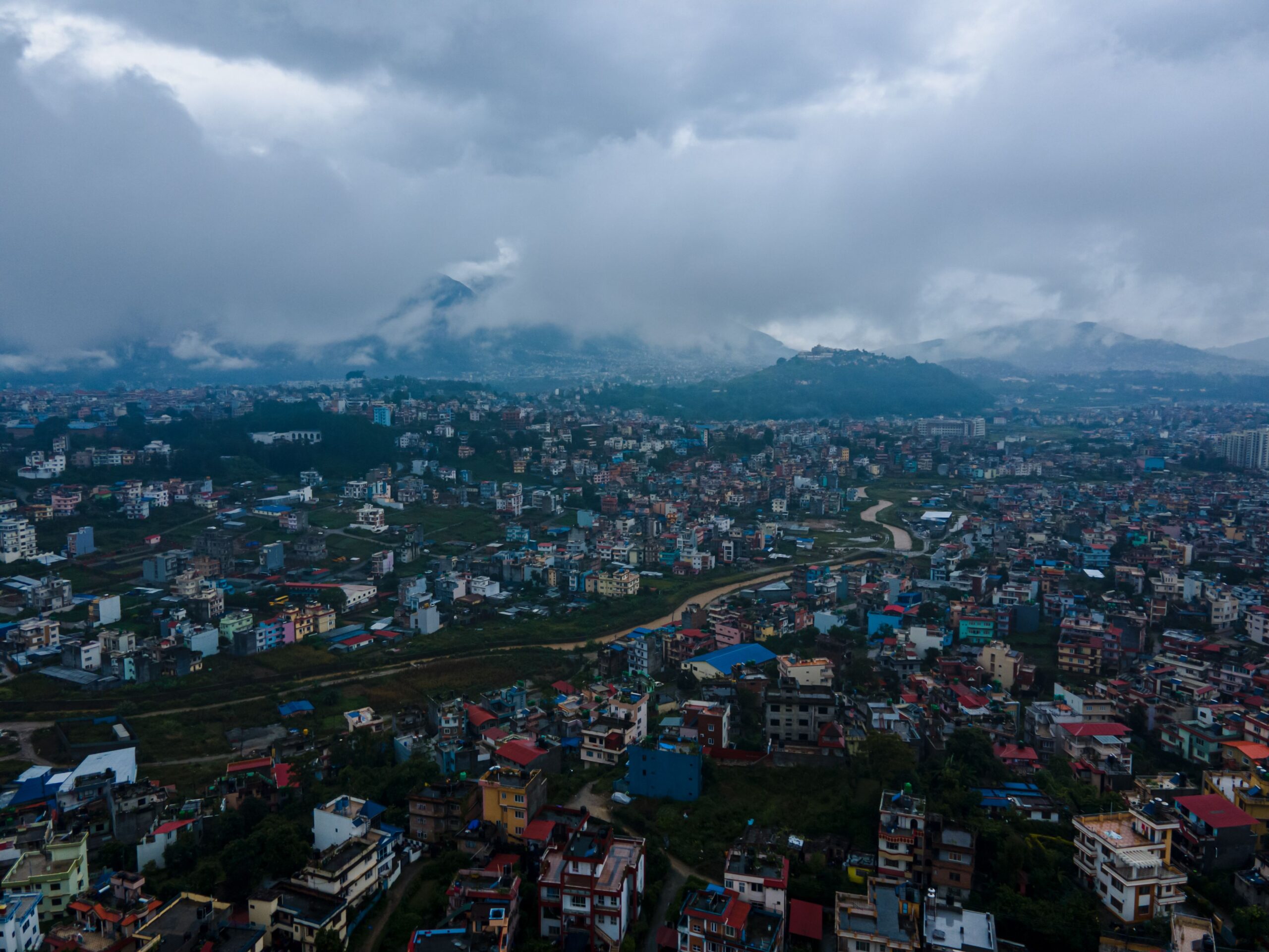 <i>Ambir Tolang/NurPhoto/Getty Images via CNN Newsource</i><br/>An aerial view of the cityscape under rainy skies in Lalitpur