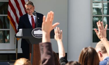 U.S. Attorney General Todd Blanche takes questions from reporters during a press briefing in the Rose Garden of the White House on September 15