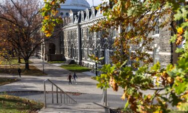 Cornell University students walk through campus in Ithaca