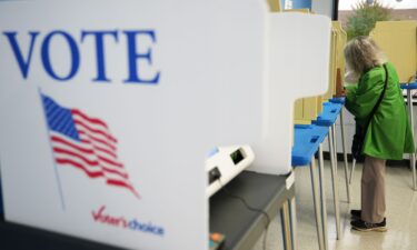 A voter cast a ballot on the first day of early voting in Minnesota on September 18 in Minneapolis.