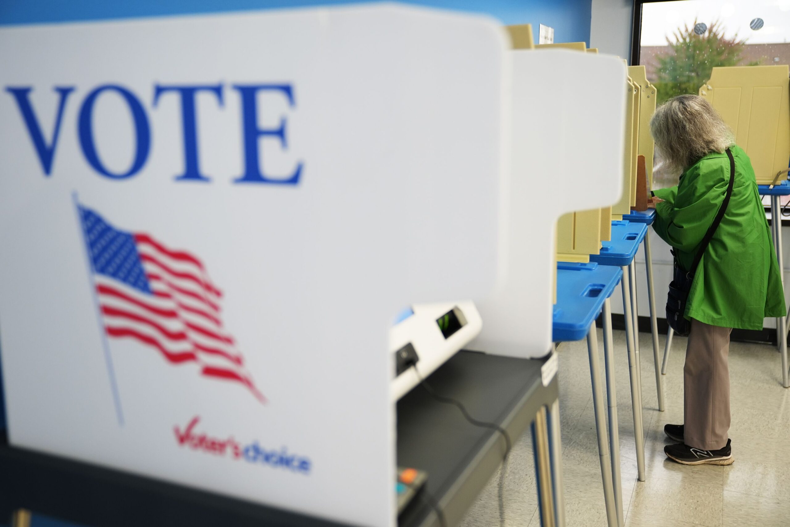 <i>Ellen Schmidt/AP via CNN Newsource</i><br/>A voter cast a ballot on the first day of early voting in Minnesota on September 18 in Minneapolis.