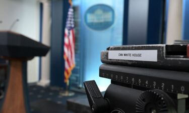A CNN sticker is seen on equipment in the James Brady press briefing room of the White House on September 19