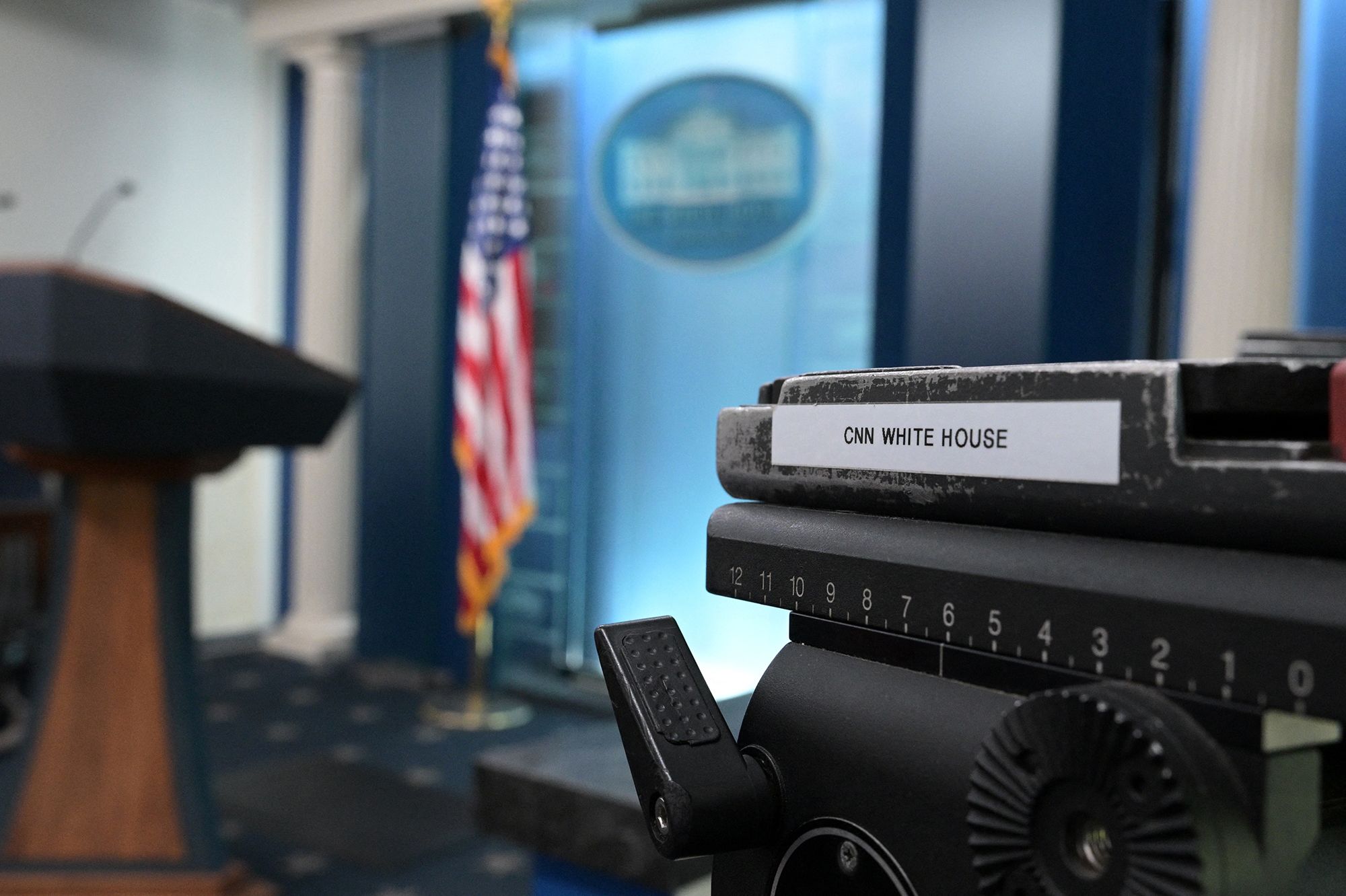 <i>Oliver Contreras/AFP/Getty Images via CNN Newsource</i><br/>A CNN sticker is seen on equipment in the James Brady press briefing room of the White House on September 19