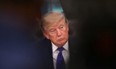 President Donald Trump speaks in the Oval Office of the White House on September 28.