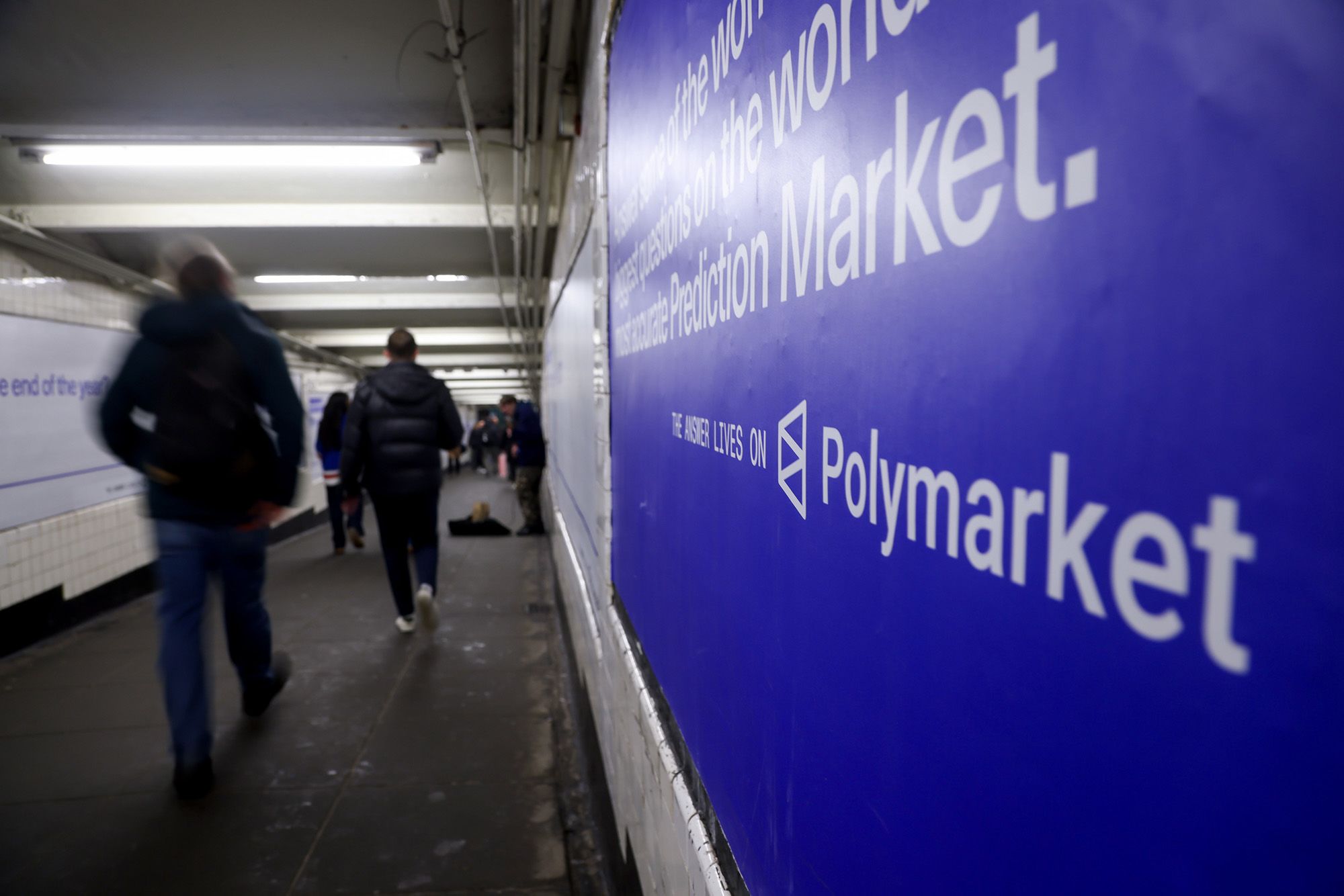 <i>Michael Nagle/Bloomberg/Getty Images via CNN Newsource</i><br/>A Polymarket advertisement in a subway station in New York City on February 5.