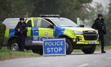 Armed police maintain road blocks and security checks around RAF Fairford on September 27.