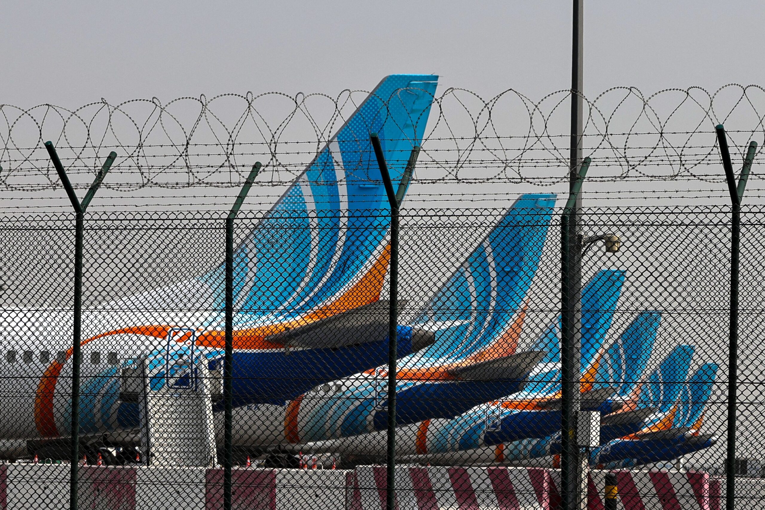 <i>Fadel Senna/AFP/Getty Images via CNN Newsource</i><br/>FlyDubai airline planes are parked on the tarmac at Dubai International Airport in Dubai on March 2