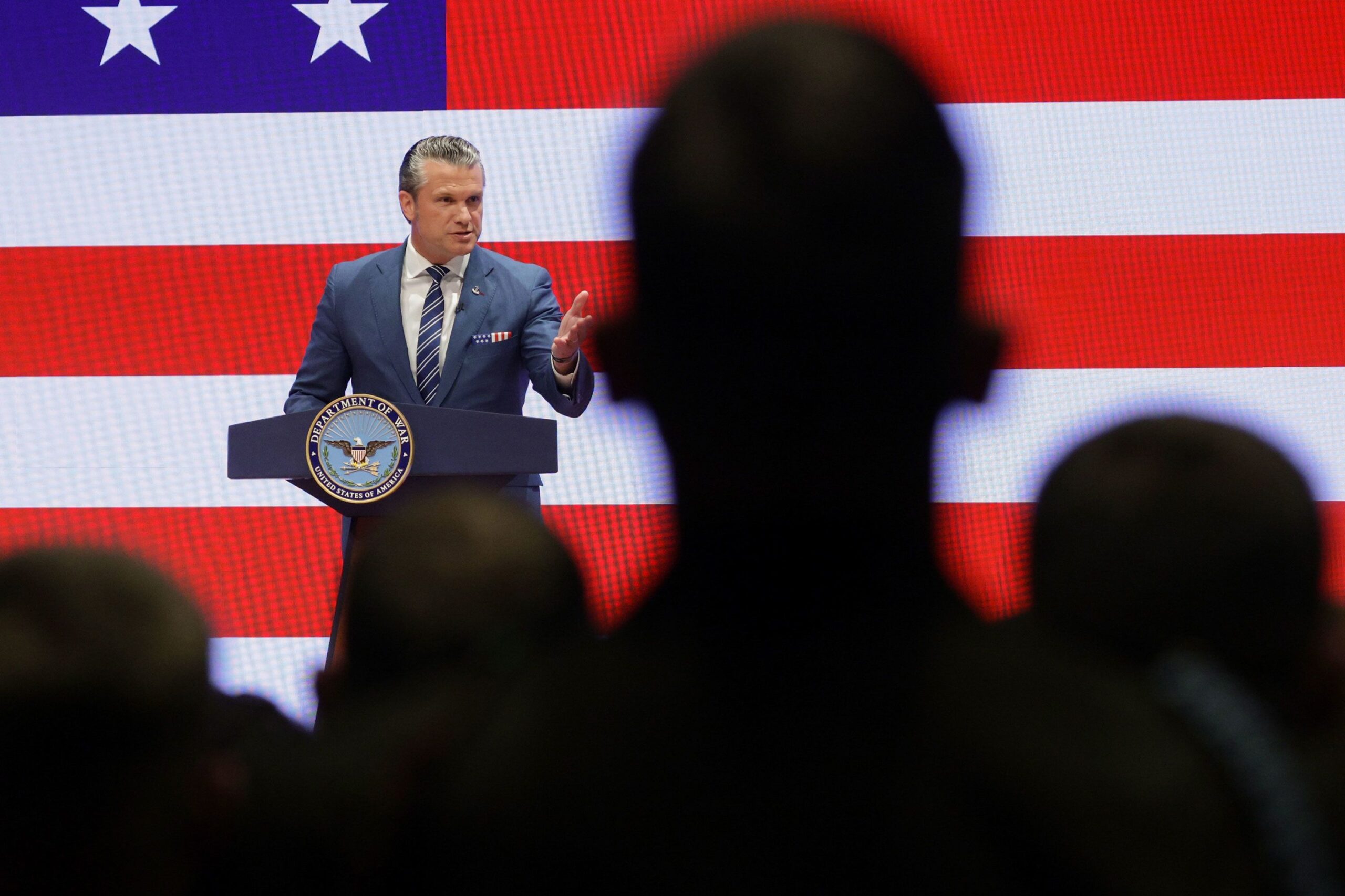 <i>Alex Wong/Getty Images via CNN Newsource</i><br/>Members of the military listen as US Secretary of Defense Pete Hegseth gives an address at Marine Corps Base Quantico on September 30 in Quantico