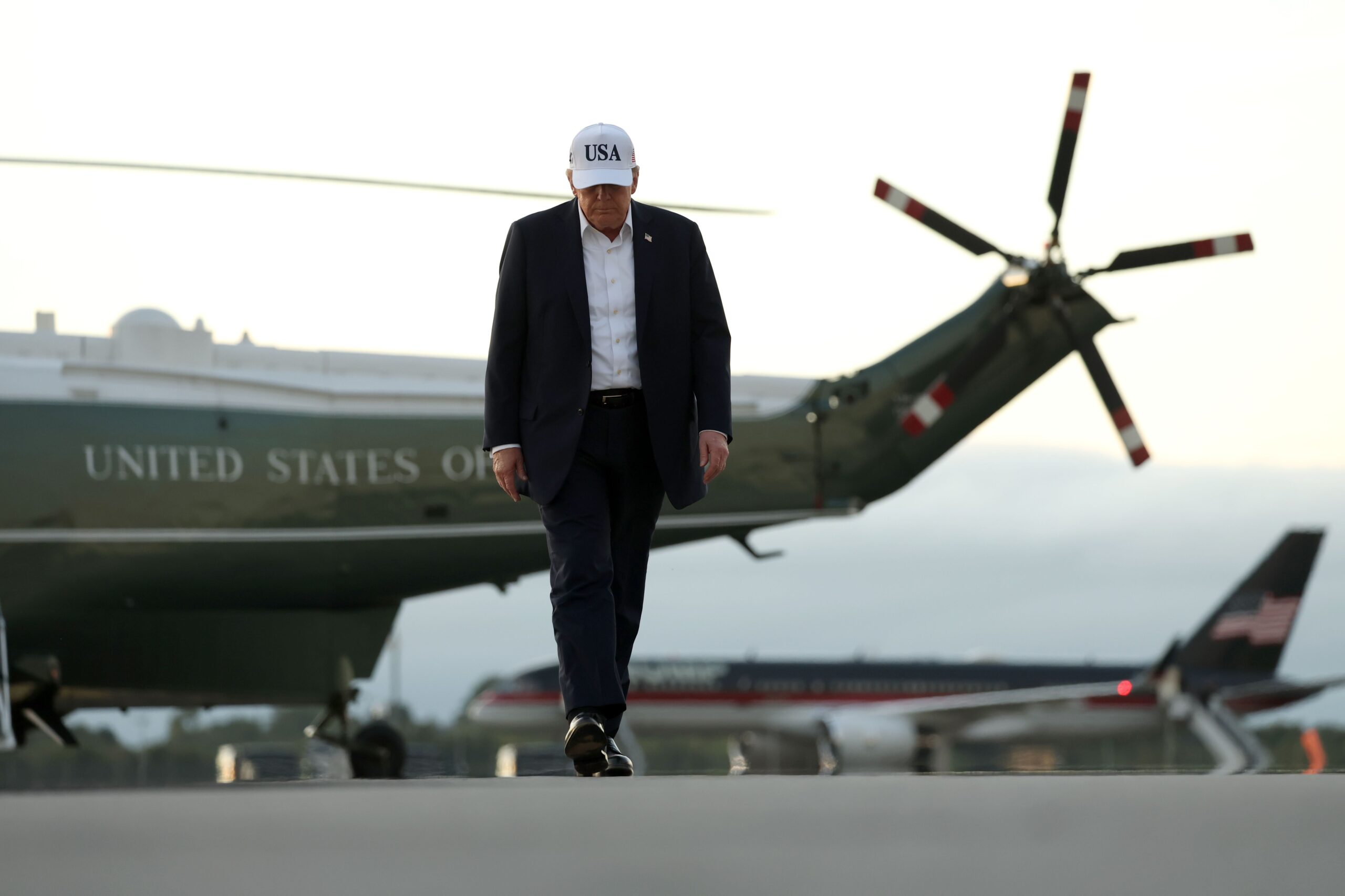 <i>Getty Images via CNN Newsource</i><br/>President Donald Trump disembarks Marine One before boarding Air Force One at Shannon Airport after attending the final day of the Irish Open on Sunday