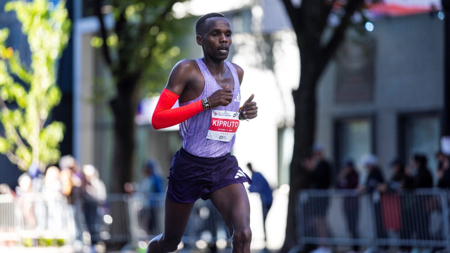 Amos Kipruto of Kenya runs during the 2025 Chicago Marathon in downtown Chicago
