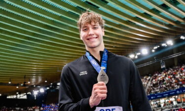 Egor Kornev of Neutral Athletes B shows the silver medal after competing in the Men's 50m Freestyle Final during the European Aquatics Championships at the Olympic Aquatic Center in Paris (France)