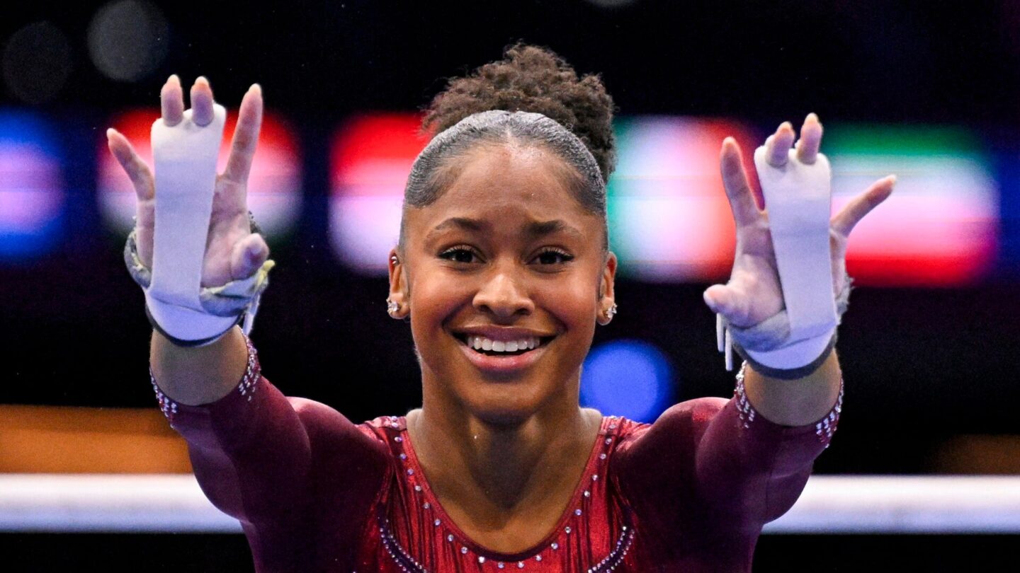 US' Skye Blakely reacts as she competes on the Uneven Bars in the Women's Individual All-Around Final during the 54th FIG Artistic Gymnastics World Championships