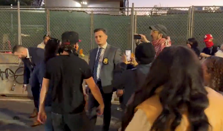 <i>CNN via CNN Newsource</i><br/>Tensions flared between protesters and NYPD officials at the scene of a shooting involving ICE agents on October 8.