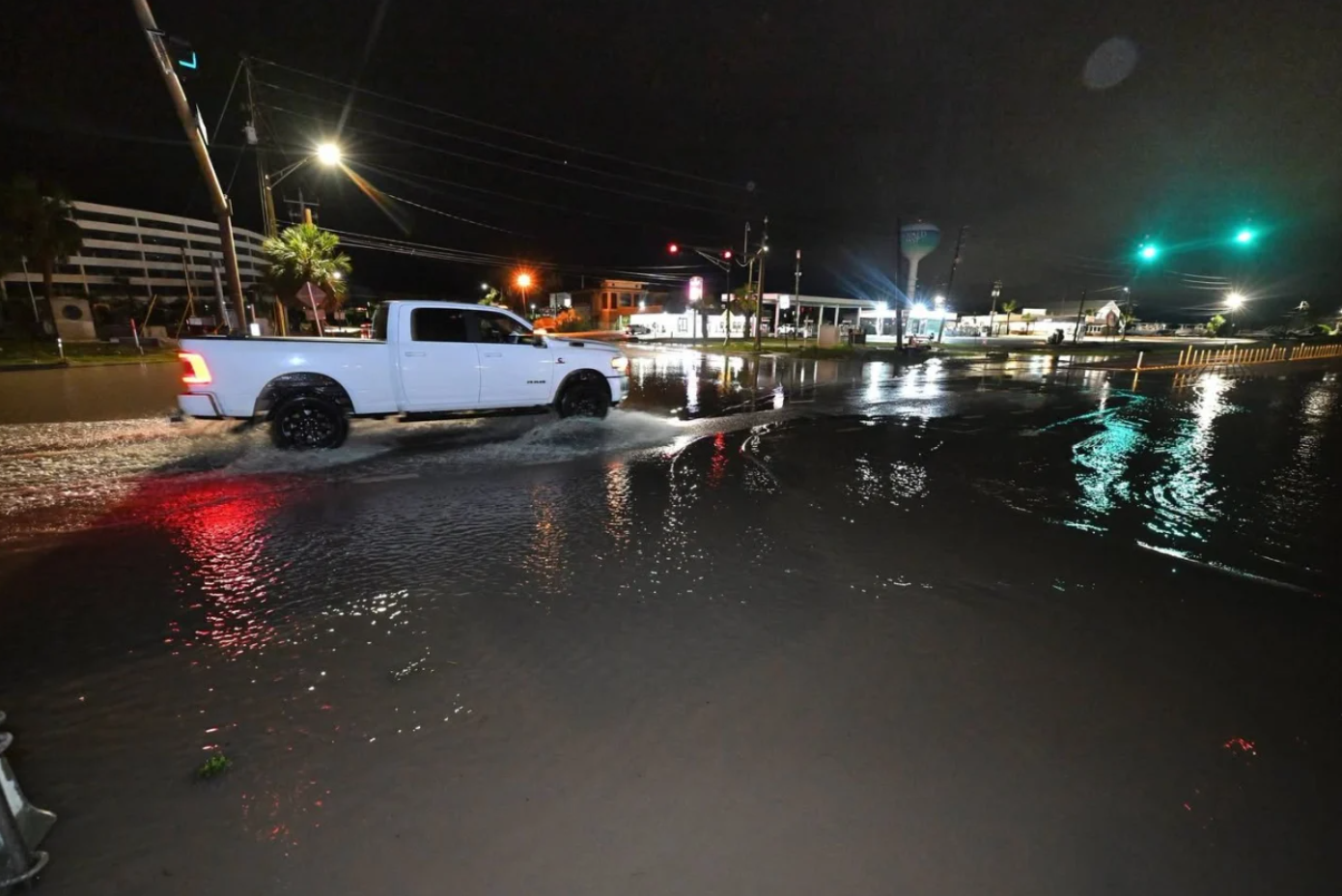 <i>Joe Raedle/Getty Images via CNN Newsource</i><br/>Debris is seen at an intersection as wind and rain from Hurricane Isaias passes through Pensacola