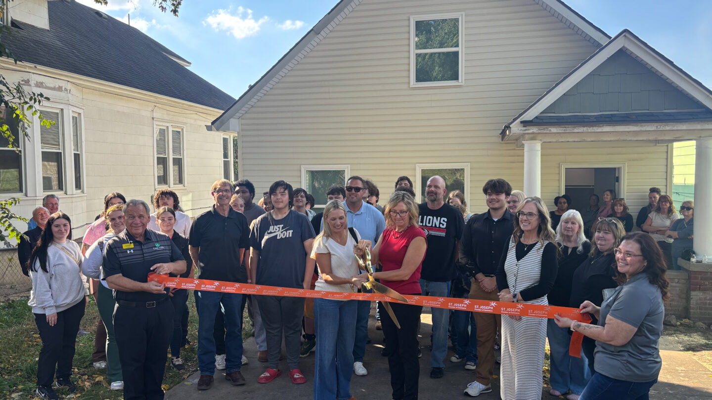The St. Joseph Chamber of Commerce ribbon cutting at newly renovation home.