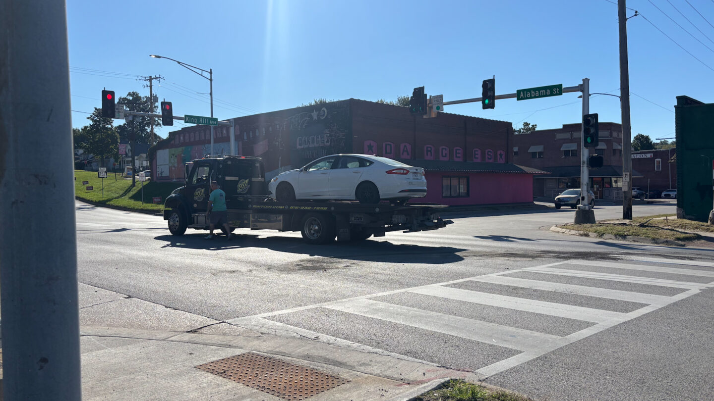 The car involved in the crash being towed.