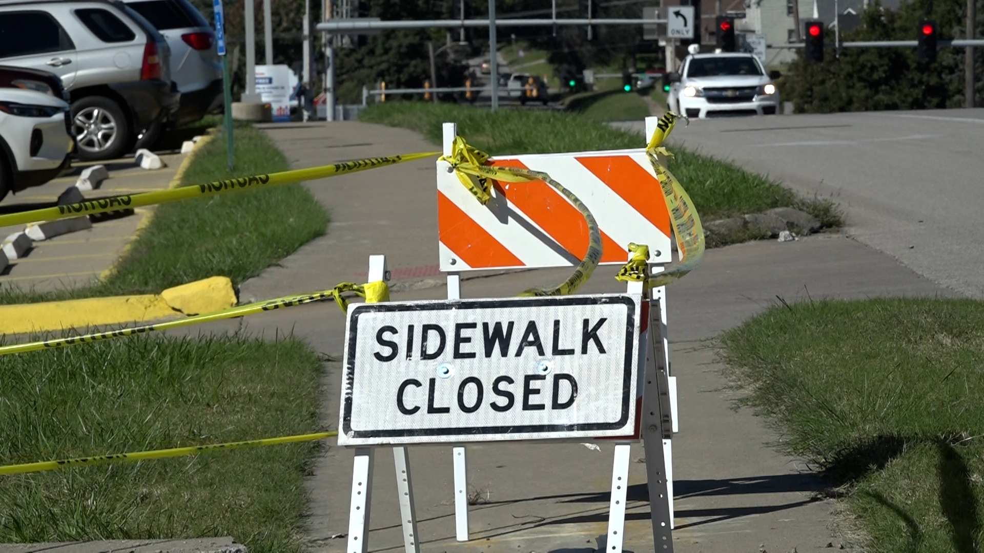 Broken sidewalk leaves mobility scooter users navigating road traffic ...