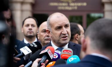 Bulgarian Prime Minister Rumen Radev speaks to members of the media outside the Presidential Palace in Sofia