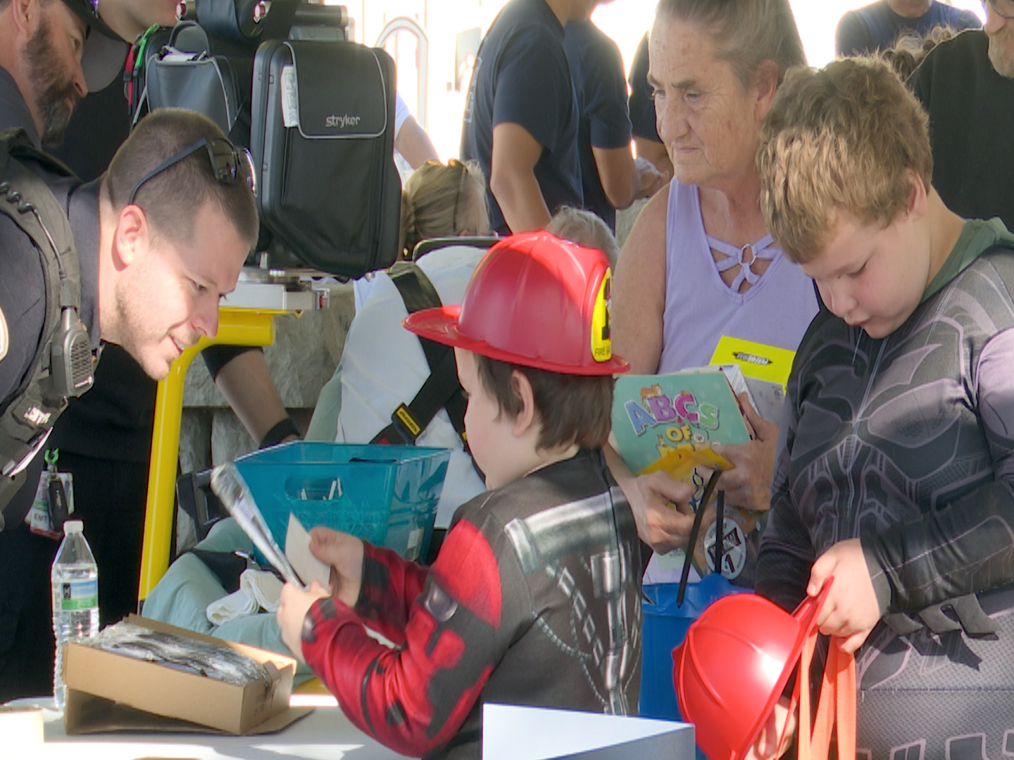 Officer Chase Connor speaks with an attendee