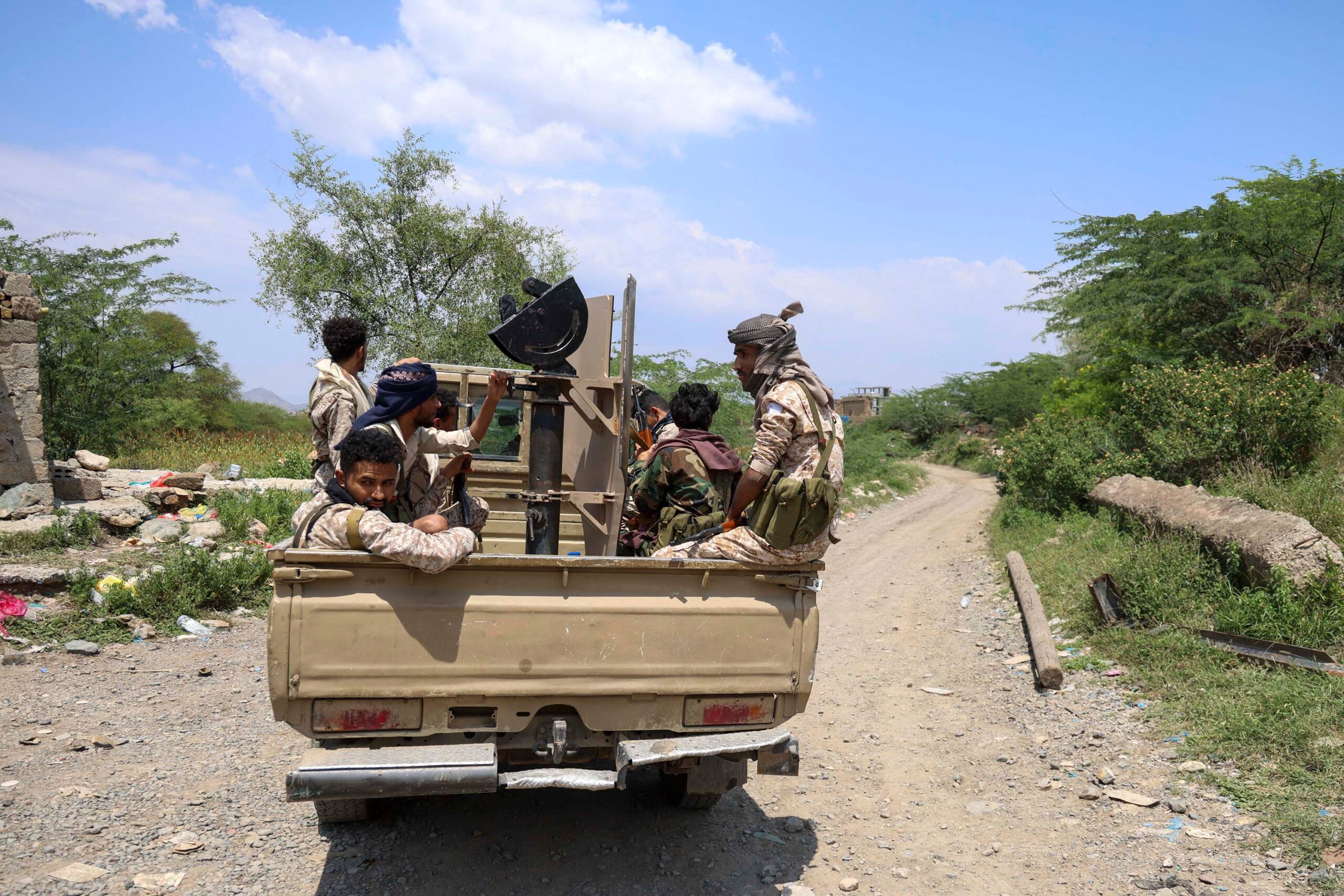 <i>Ahmad Al-Basha/AFP/Getty Images via CNN Newsource</i><br/>Saudi-backed Yemen government soldiers ride in a pick-up truck near the Jabal Han front