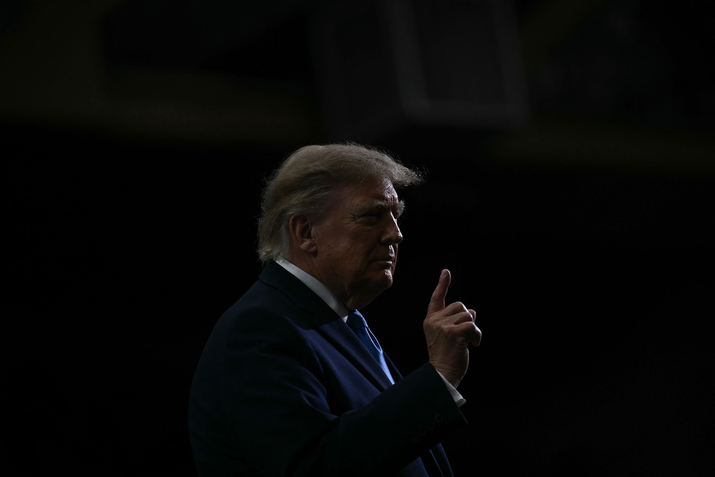<i>Anna Moneymaker/Getty Images via CNN Newsource</i><br/>President Donald Trump walks off the stage after speaking at a campaign rally at the University of South Alabama in Mobile