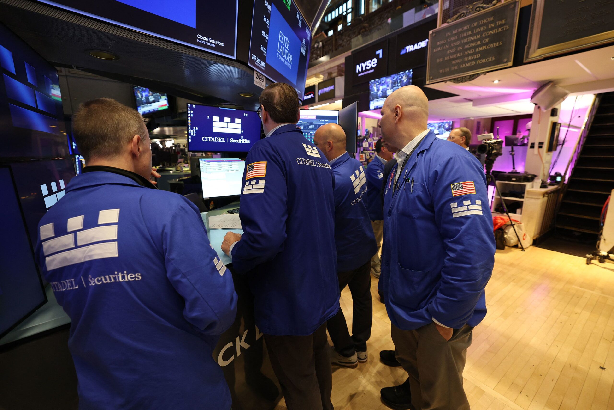 <i>Timothy A. Clary/AFP/Getty Images via CNN Newsource</i><br/>Traders work on the floor of the New York Stock Exchange at the opening bell in New York on Monday.