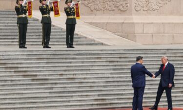 President Donald Trump is greeted by Chinese President Xi Jinping during a welcome ceremony at the Great Hall of the People on May 14 in Beijing.