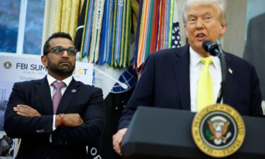 FBI Director Kash Patel looks on as President Donald Trump speaks during a press conference in October 2025.