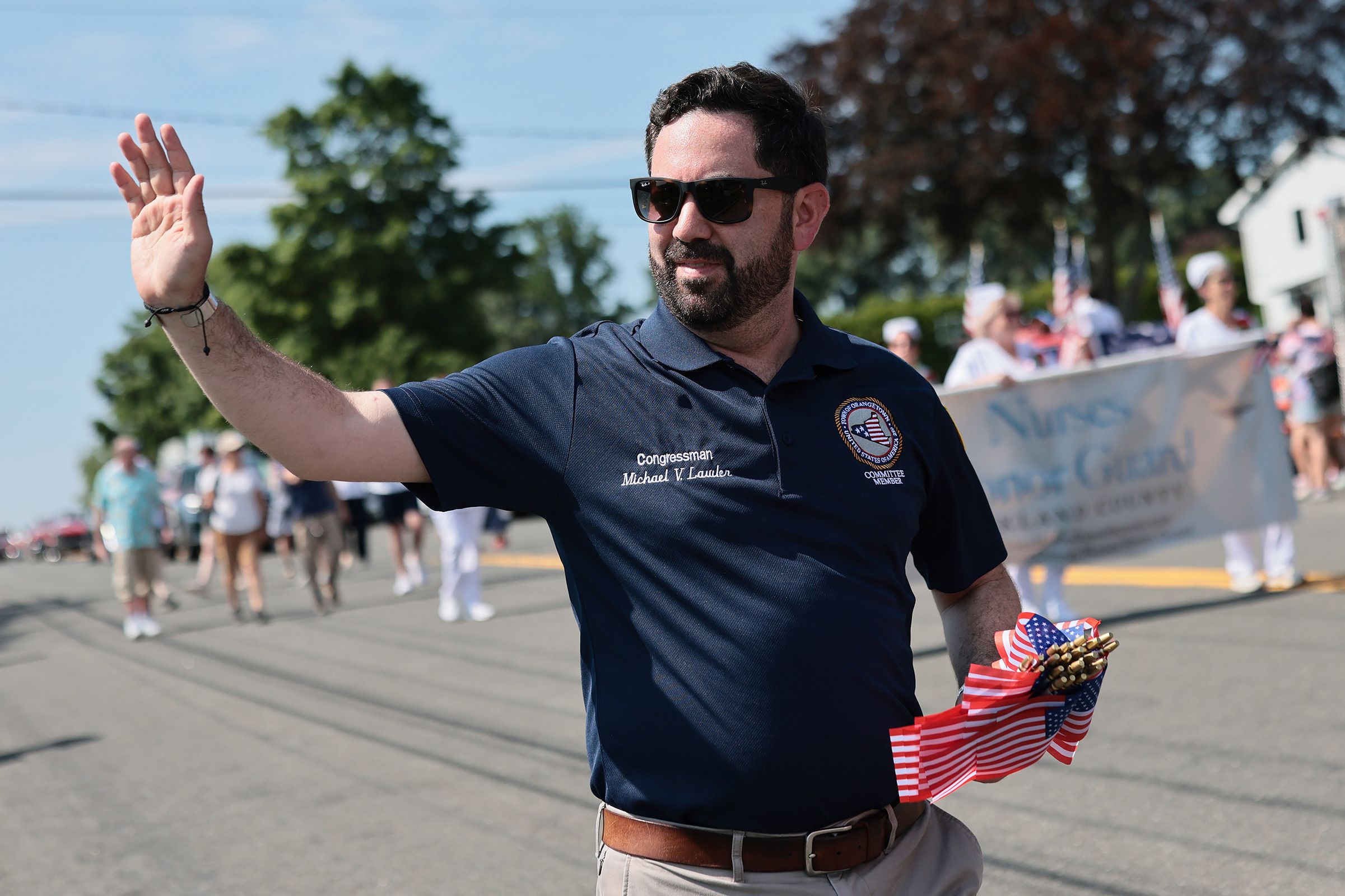 <i>Michael M. Santiago/Getty Images via CNN Newsource</i><br/>Rep. Mike Lawler walks in a July 4 parade in Tappan