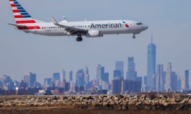 A file photo of an American Airlines plane landing at JFK International Airport in New York. An American Airlines flight from Madrid diverted to New York  after all but two of the lavatories on the Boeing 777 stopped working.