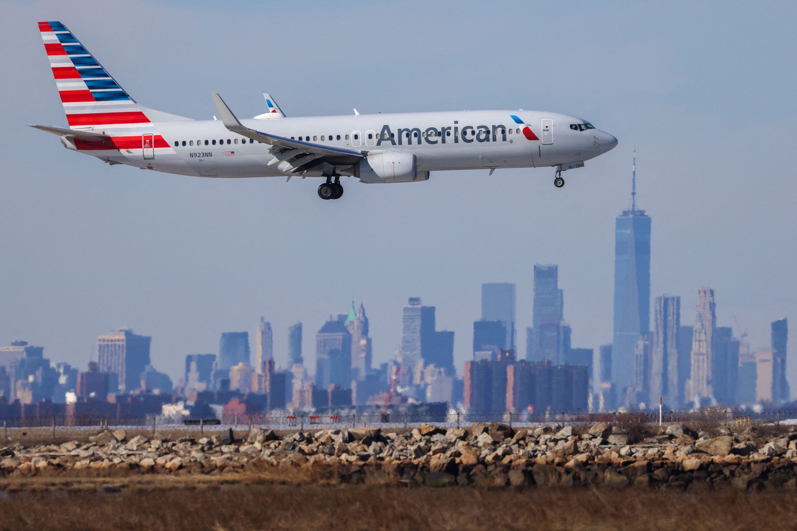 <i>Charly Triballeau/AFP/Getty Images/File via CNN Newsource</i><br/>A file photo of an American Airlines plane landing at JFK International Airport in New York. An American Airlines flight from Madrid diverted to New York  after all but two of the lavatories on the Boeing 777 stopped working.