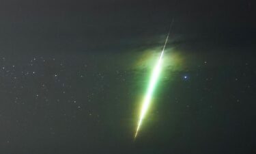 A meteor streaks across the sky during the Draconids over the county of Northumberland in England in October 2021.