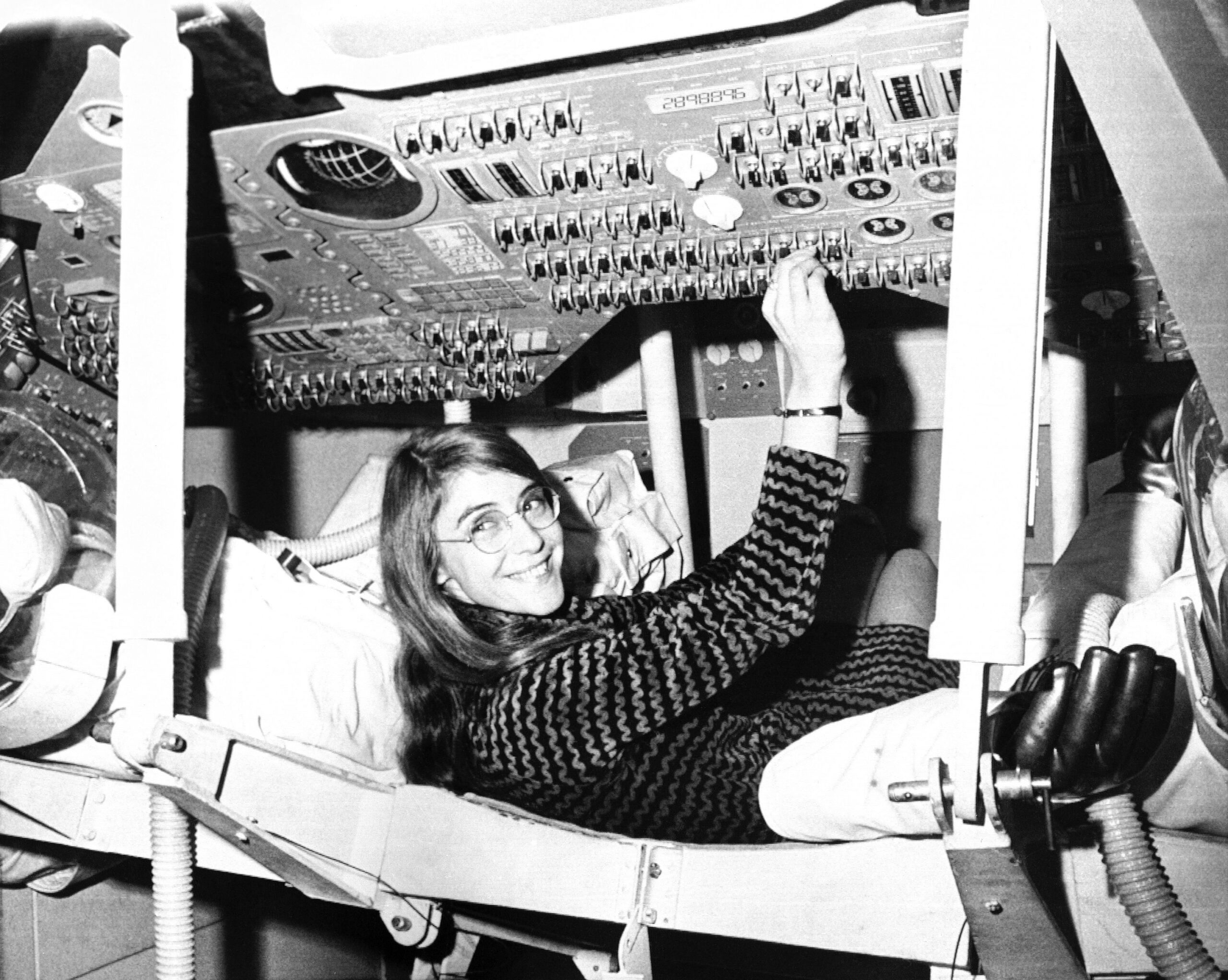 <i>AP via CNN Newsource</i><br/>Margaret Hamilton sits in mock-up of an Apollo command module on display at the Cambridge school
