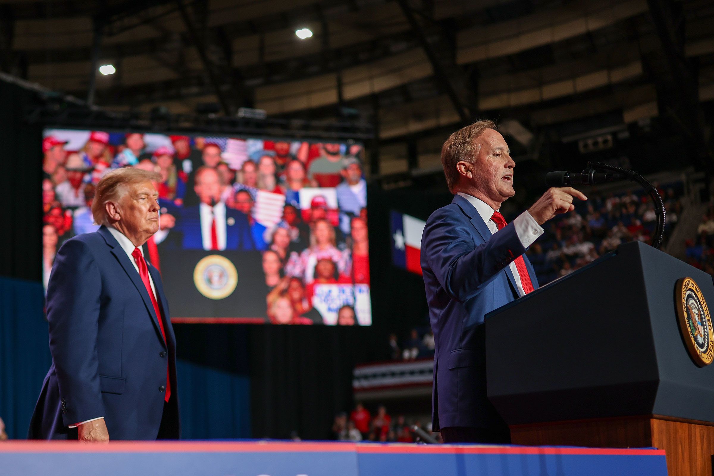 <i>Win McNamee/Getty Images via CNN Newsource</i><br/>President Donald Trump listens as Republican Senate candidate and Texas Attorney General Ken Paxton speaks during a campaign rally in San Antonio