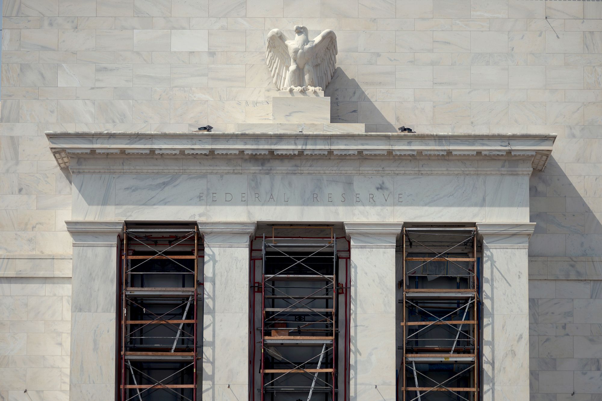 <i>Alex Wong/Getty Images via CNN Newsource</i><br/>A marble American eagle sculpture sits atop of the Marriner S. Eccles Federal Reserve Board Building in Washington