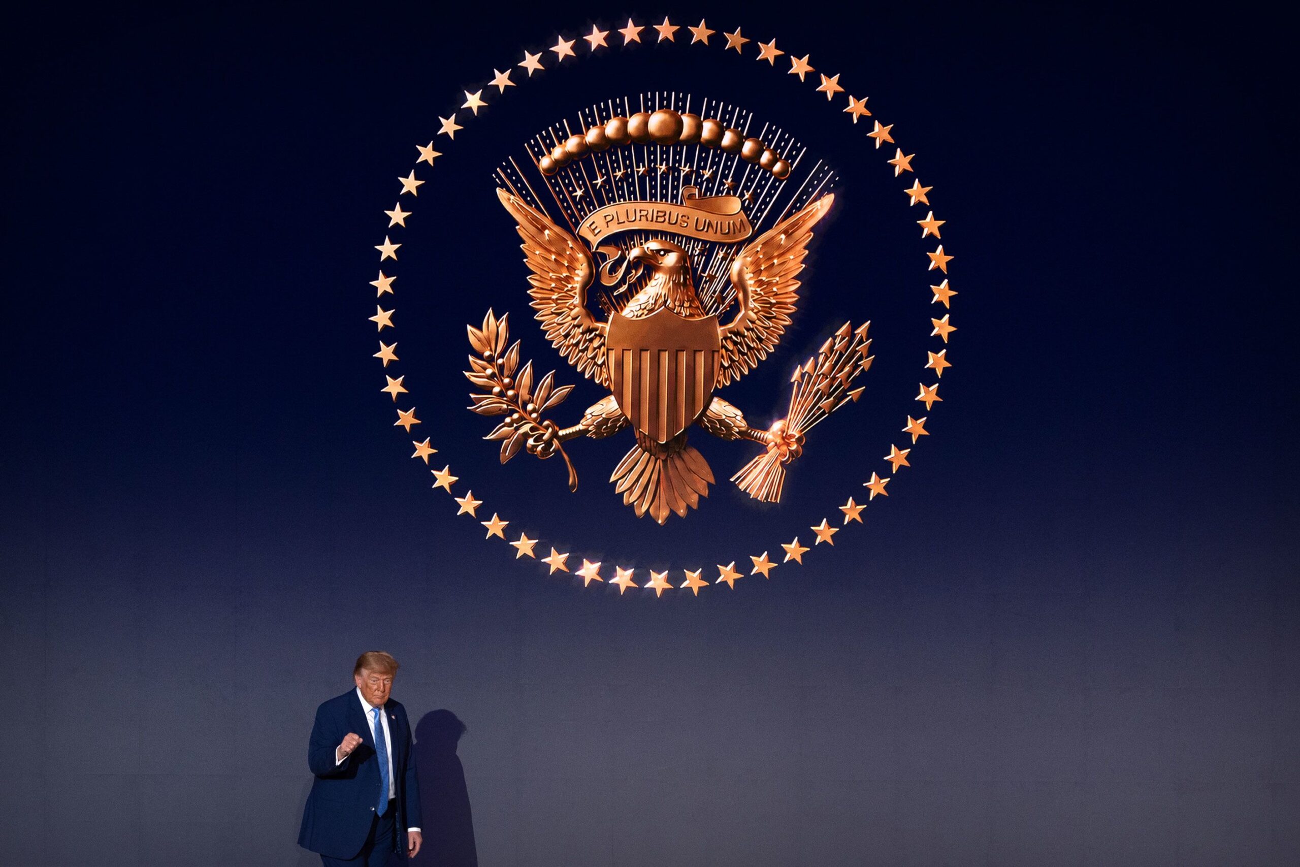 <i>Mark Schiefelbein/AP via CNN Newsource</i><br/>President Donald Trump walks across the stage during an event to mark the launch of the America.gov website on September 29