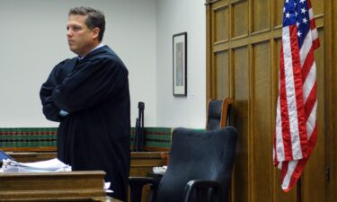 Seattle US Attorney and Former King County Superior Court Judge Roger Rogoff stands in court in Seattle