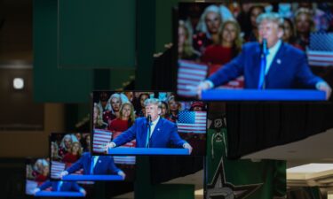 President Donald Trump speaks on screens during the first day of the Republican Midterm Convention at the American Airlines Center in Dallas